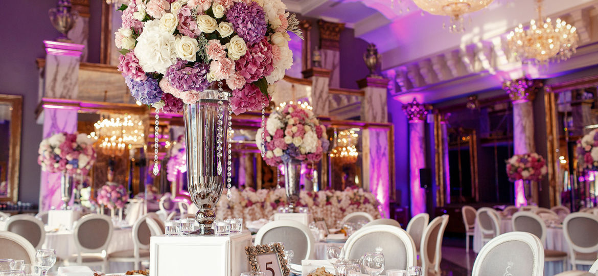 Table number 5 decorated with pink and violet hydrangeas and ser