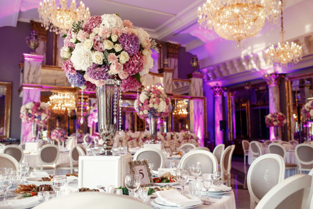 Table number 5 decorated with pink and violet hydrangeas and ser