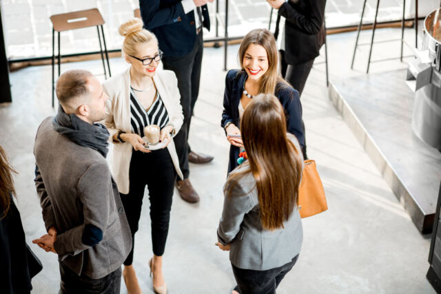 Business people talking indoors