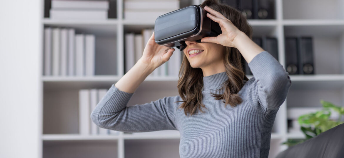 Surprised Young latin woman in VR headset touching air, Smiling