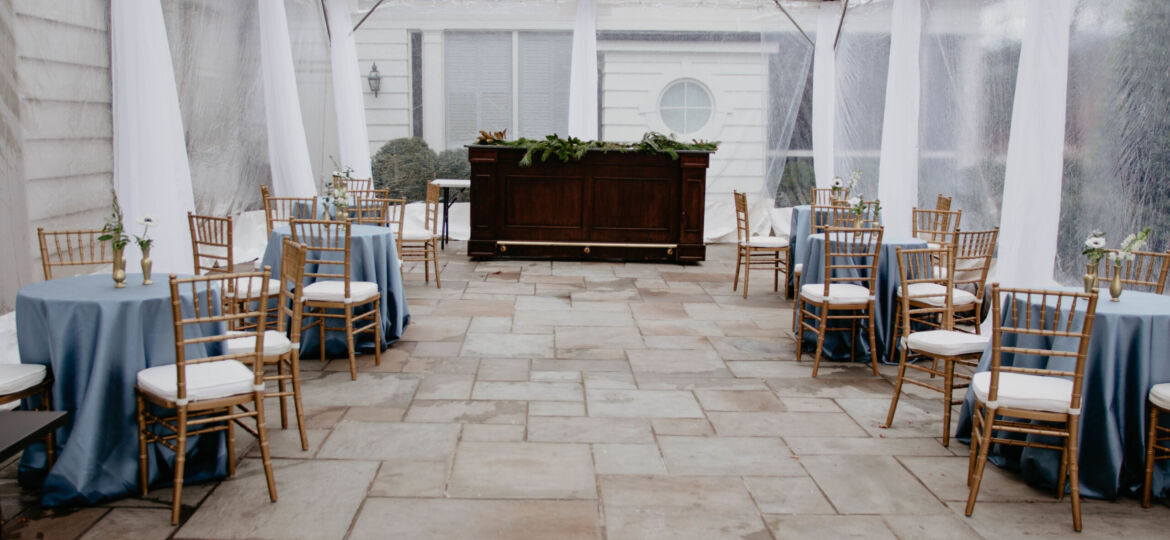 Outdoor tent venue for an event on a rainy day