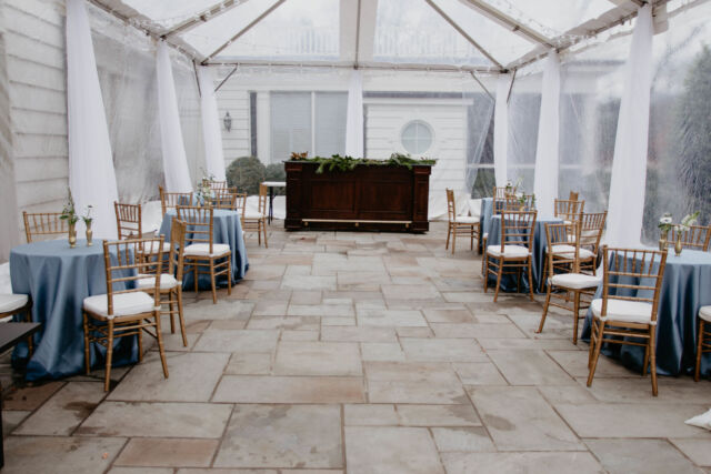 Outdoor tent venue for an event on a rainy day