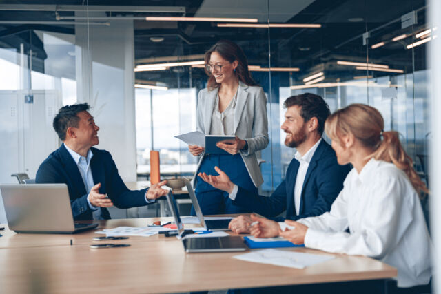 A group of business people partners during a set team meeting in the modern office