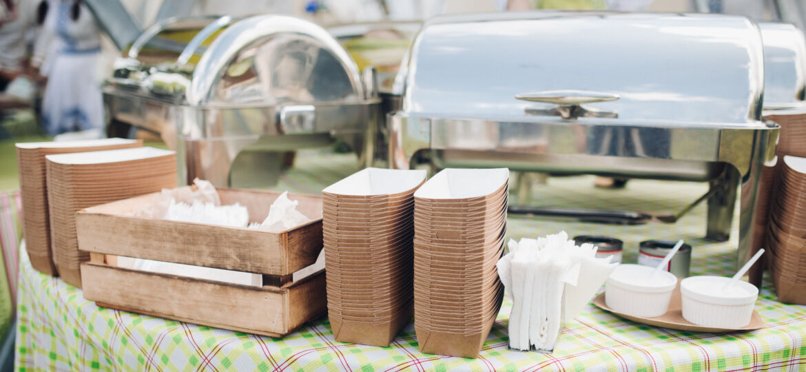 A table with served food and containers.