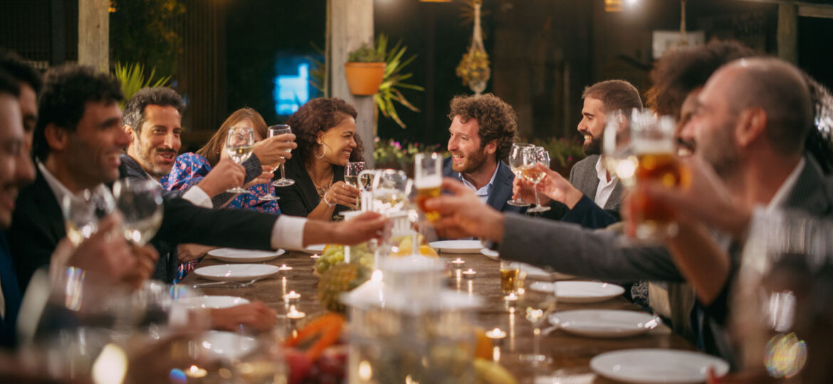 Big Dinner Party with a Small Crowd of Multiethnic Diverse Frien