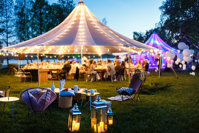 Colorful wedding tents at night